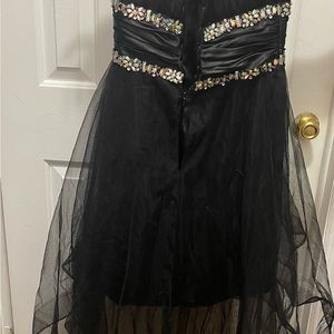 Black high low dress . Size 2 . Sweetheart top
